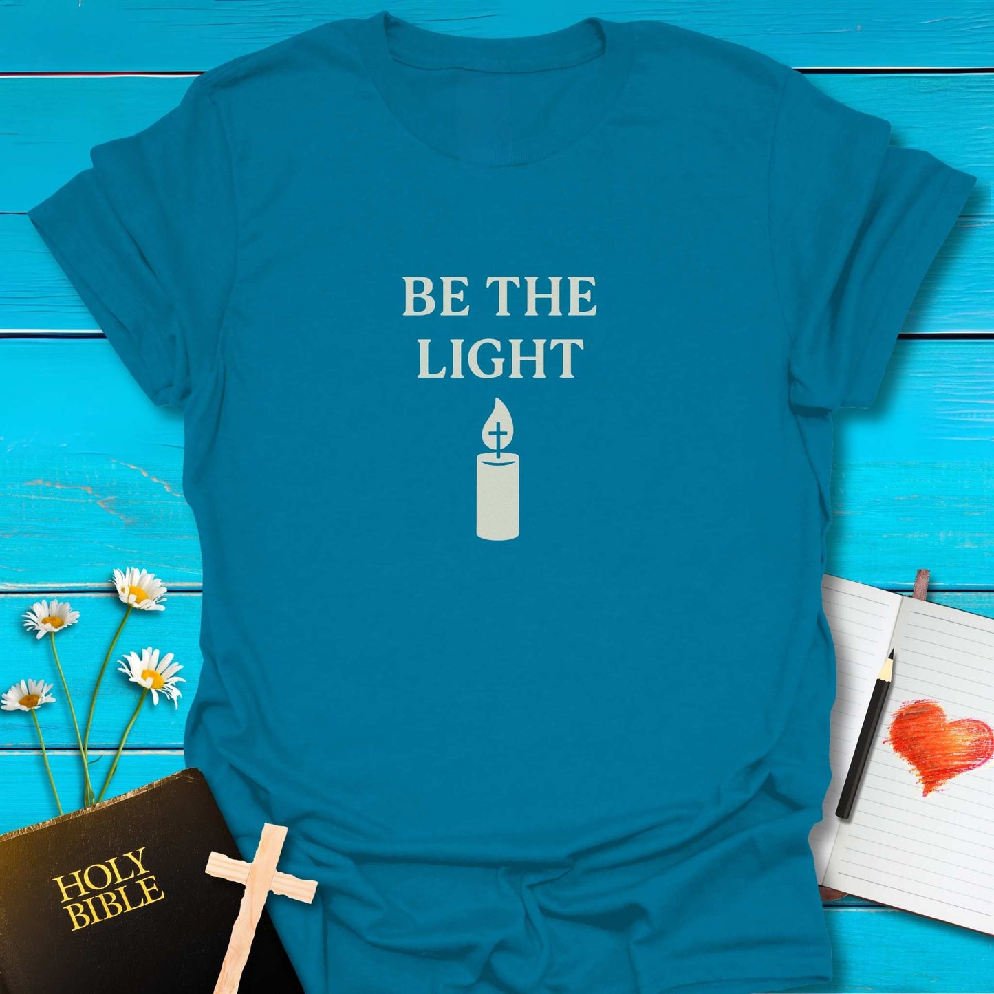 T-Shirt Heather Galapagos Blue / S Be the Candle Light T-Shirt Echo Kindness Printify