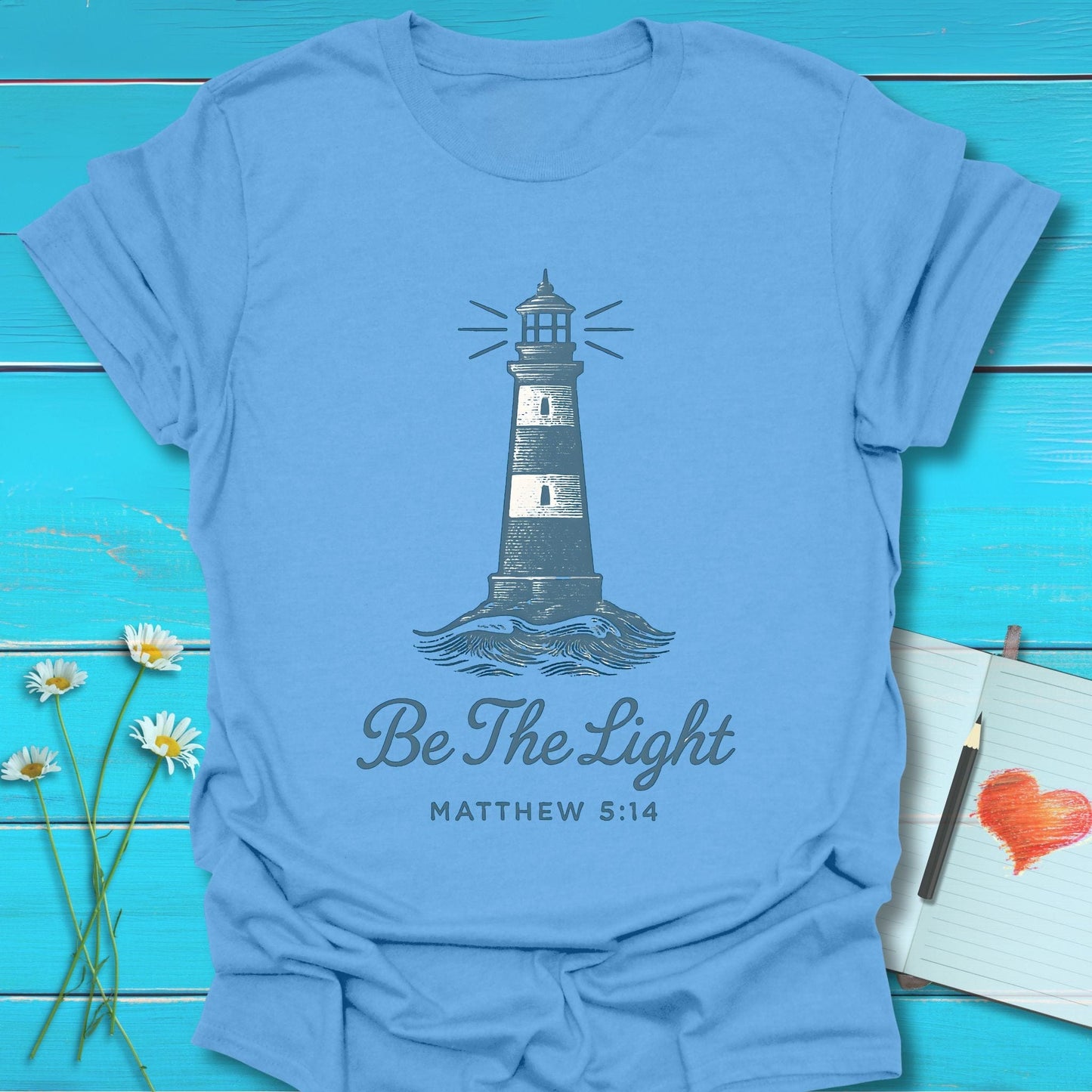 T-Shirt Carolina Blue / S Be the Light T-Shirt Echo Kindness Printify