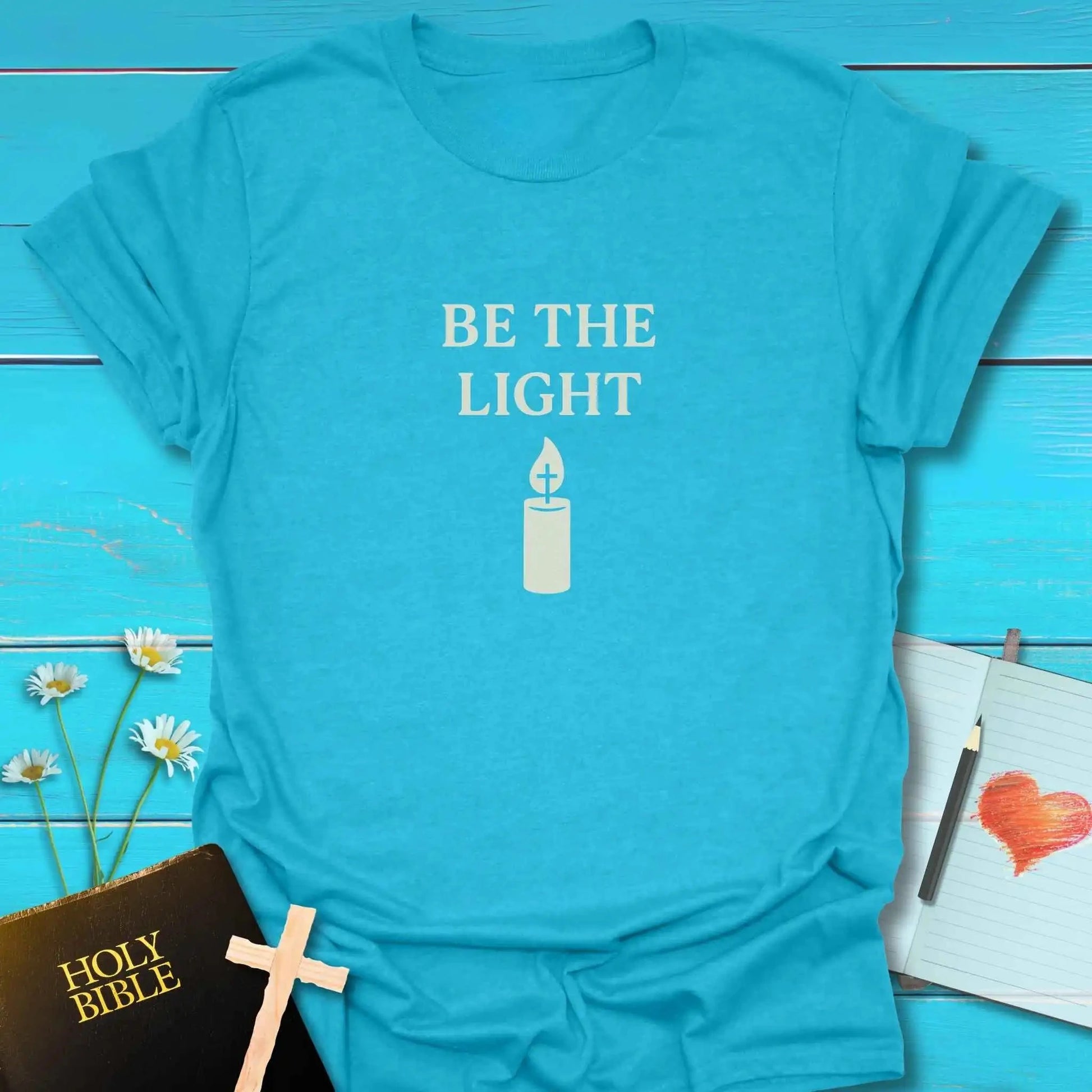 T-Shirt Heather Galapagos Blue / S Be the Candle Light T-Shirt Echo Kindness Printify